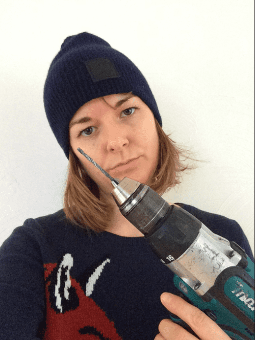 Getting to know my way around a drill…while wearing cashmere.