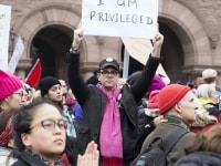 TORONTO, ON: Women's March Toronto. Saturday January 20th 2017. Queen's Park followed by March to US Consulate followed by City Hall. Speakers and musicians present. 50,000 + people in attendance. Photos by Solana Cain