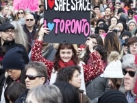 TORONTO, ON: Women's March Toronto. Saturday January 20th 2017. Queen's Park followed by March to US Consulate followed by City Hall. Speakers and musicians present. 50,000 + people in attendance. Photos by Solana Cain