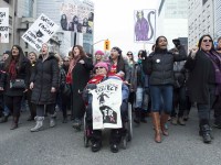 TORONTO, ON: Women's March Toronto. Saturday January 20th 2017. Queen's Park followed by March to US Consulate followed by City Hall. Speakers and musicians present. 50,000 + people in attendance. Photos by Solana Cain