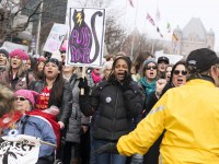 TORONTO, ON: Women's March Toronto. Saturday January 20th 2017. Queen's Park followed by March to US Consulate followed by City Hall. Speakers and musicians present. 50,000 + people in attendance. Photos by Solana Cain