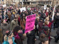 TORONTO, ON: Women's March Toronto. Saturday January 20th 2017. Queen's Park followed by March to US Consulate followed by City Hall. Speakers and musicians present. 50,000 + people in attendance. Photos by Solana Cain