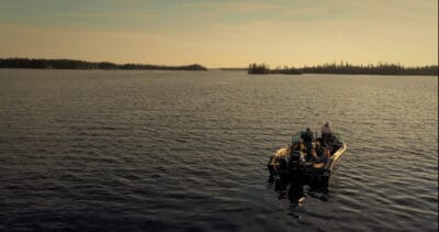 Still from Beneath The Surface of a boat on a lake
